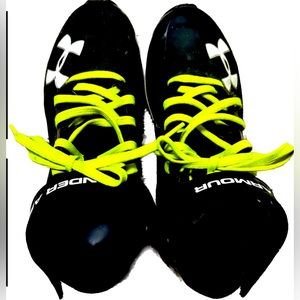 Under Armour Football cleats. Black with Neon yellow/green laces Boys Size 5Y